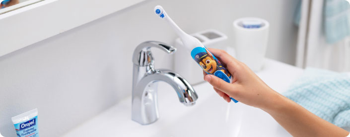 Super Mario Spinbrush and Orajel Kids Toothpaste.