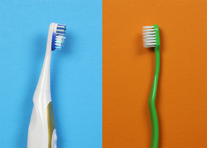 Spinbrush electric toothbrush compared to manual toothbrush.